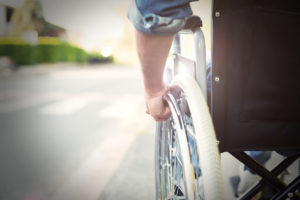 Detail of a disabled man on a wheelchair