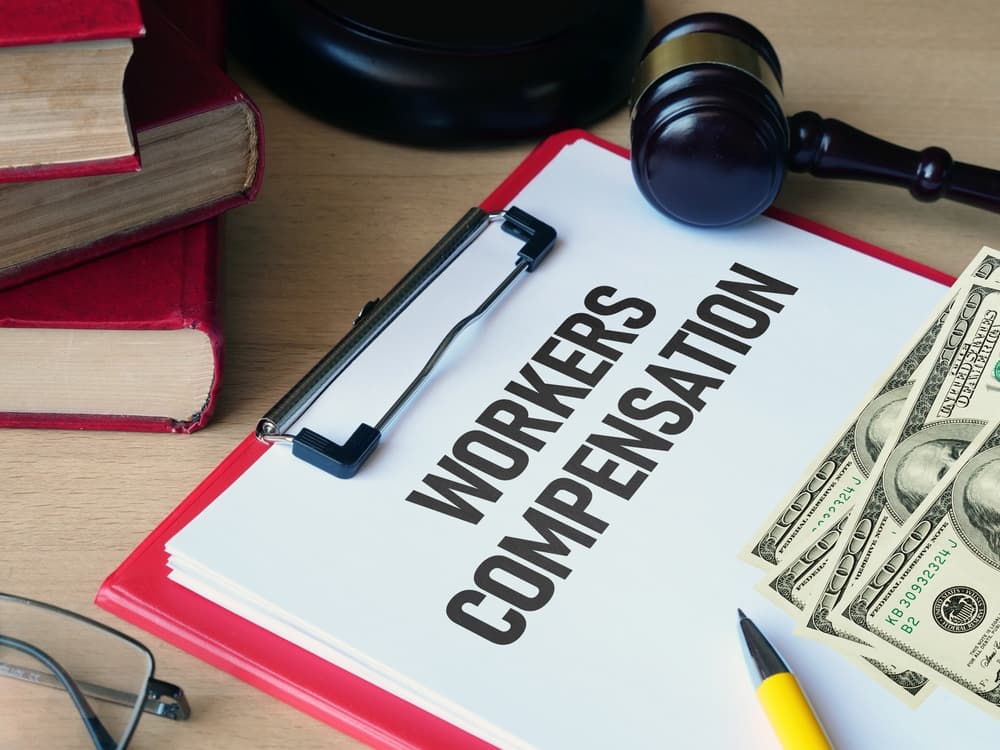 The concept of workers' compensation is represented through displayed text.






