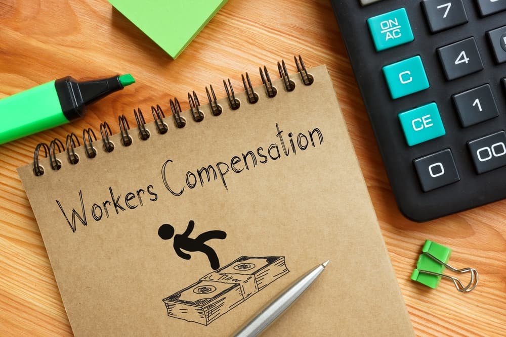 The text "Workers Compensation" is displayed on a business-themed image.






