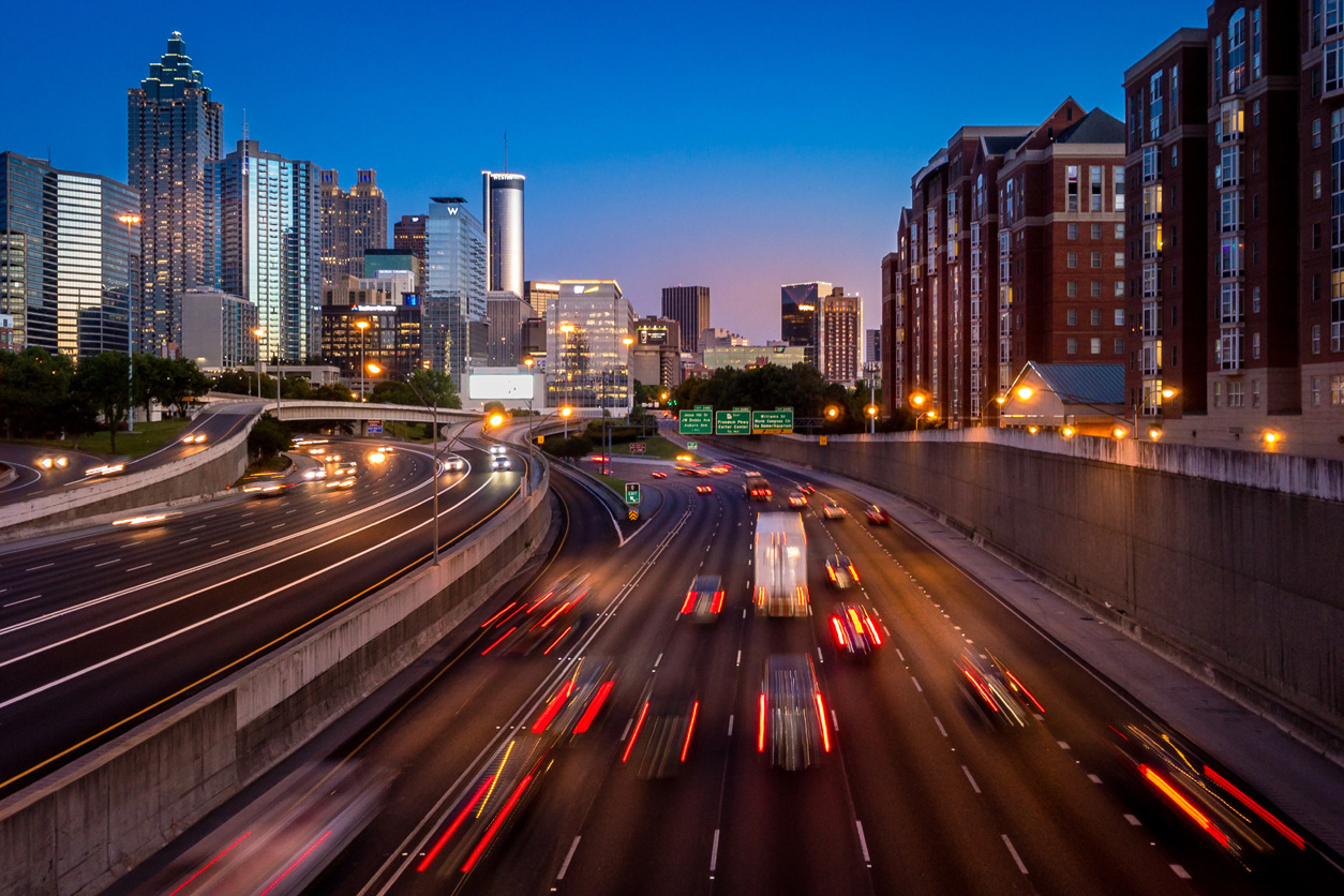 Downtown Atlanta at Twilight blurred cars on highway