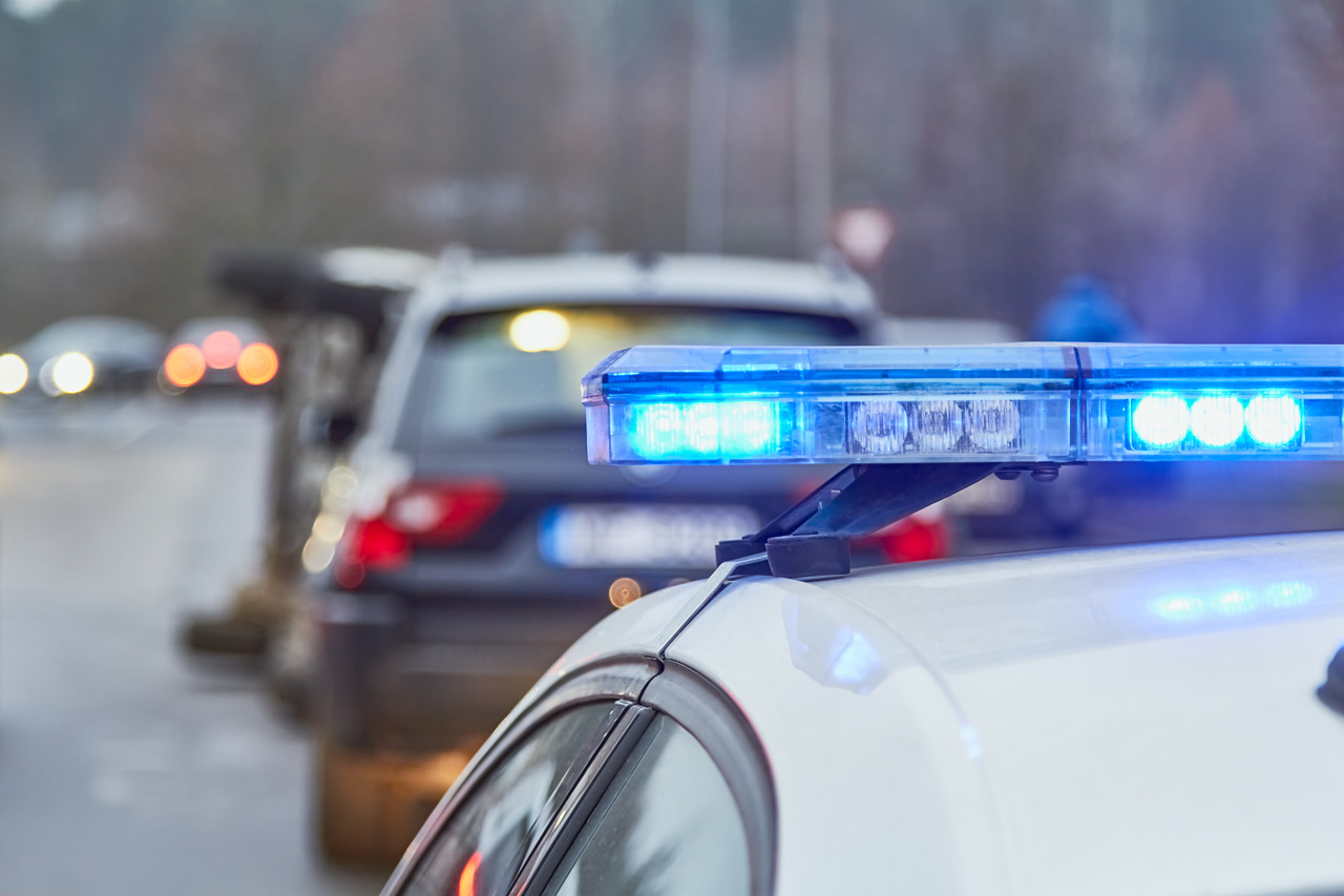 Police car blue lights on a car accident place