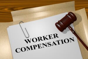 3D illustration of "WORKER COMPENSATION" title on legal document